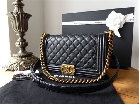 chanel boy bag medium black gold hardware|Chanel boy new medium price.